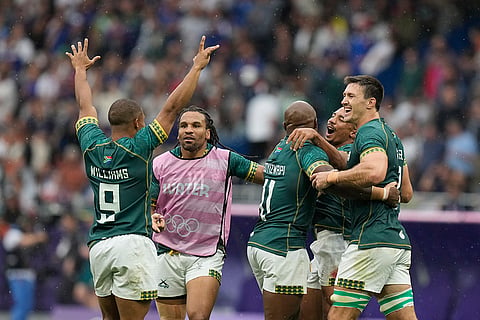 South African team celebrate after winning men's bronze medal in Rugby Sevens